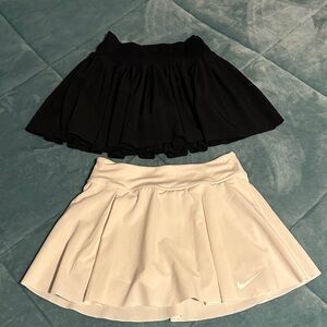 Nike Black and White Women's Skater Skirts both included.